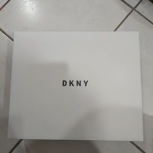 DKNY hat and small bag